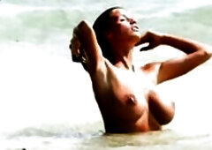 Katie Price fantastic beach topless