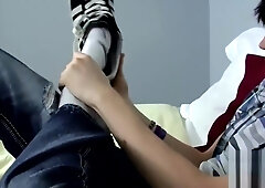 Young emo Tyler Bolt jacks off his cock and licks his toes