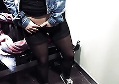 Shaking climax. Shopping. Hose and sneakers in public changing room HD
