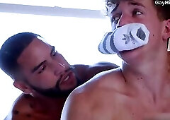 The boy lets the tattooed man use him