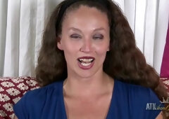 Ava Bella gets her shaved pussy all wet as she masturbates