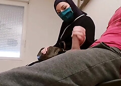 Muslim girl is providing a hj to a random, crazy fellow, in front of a covert camera