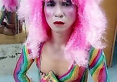 Transgender Le wears sexy clothes and plays cups of sex. Artificial cans