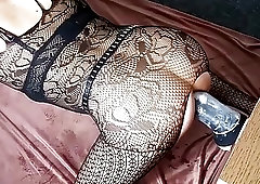 Glamorous shemale in erotic lingerie anal rides a massive dildo