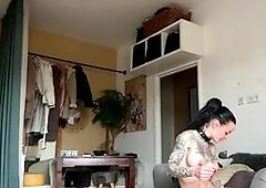 Inked Babe Plays with Big Dildo