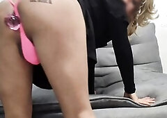 Sissy in mini costume walking outdoors with a crystal sex-toy up her butt