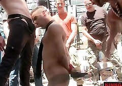 Leon Fox held down as the guys edge his hard cock with foot jobs