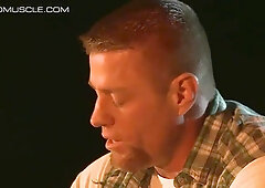 Beefy cowboy gets trussed up to the front of a van