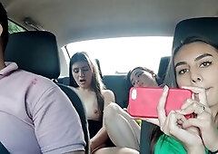 Steamy young vixens tease the driver into some naughty fun