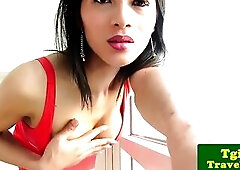Oriental t-girl Lulu fingers her taut ass