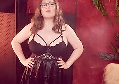 Arya Grander showcases confidence in a mini black dress try-on haul featuring lace and satin