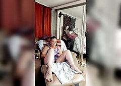 Filming up girlfriends minidress whilst that babe smokes and plays clip games in her moist juicy pants