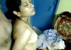 Indian gal is deep throating her hubby's fuck-stick in front of the camera and liking it a bunch