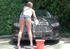 Amirah Adara in heels, tight shorts and a-shirt washing her ex's car