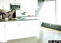 Sabrina begins sucking on Jasons large ebony wang right in the kitchen and lets him screw her hard until that babe cums all over herself. See the movi