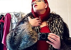 Red vixen teasing in the mirror