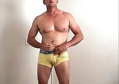 Stripping and working out before getting off on the bed