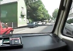 Golden-haired has no problem sucking knob in the car