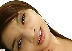 Busty Asian shemale moans while being roughly doggy style fucked