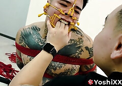 Submissive Yoshi Kawasaki moans while being bound and gagged