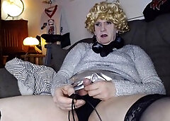 Mature shemale with ash-blonde hair enjoys ass play and anal sex