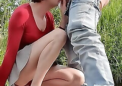 Annemieke in red lingery outdoor in public giving blowjob