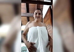 Excited woman rubs her twat with her sex-toy