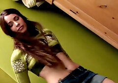 Watch this young inked hottie tease and pleasure herself in tight thong and skirt