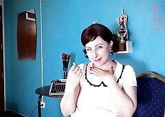 Red lipstick giving a kiss teasing by Regina Noir.