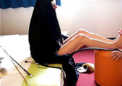 brutish sadistic Nun flogging a marionette very hard