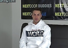 Solo tattooed jock pulls out cock and wanks on casting