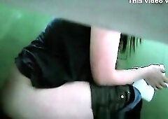 Hidden water closet camera catches woman pulling down her panties and seat to take a pee. That Babe cleans her twat and pulls her garments up.