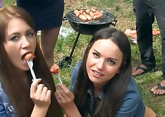 Naughty babes merge bodies and start touching pussies at picnic