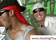 Black thug sucks two white cocks