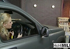 Busty blonde in lingerie and stockings bribes the parking police