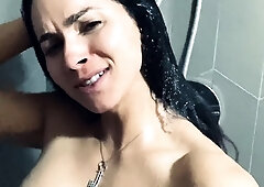 Busty curly brunette with big boobs fucks on couch