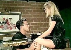 Slutty blonde babe gets fucked hard in the pussy on a desk