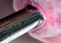 Unleashing utterly cock-squeezing 14mm urethral teardrop buttplug close-up.