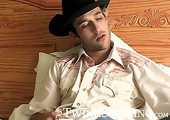 Hottie Cody lights his red cig while stroking his pinkish cock