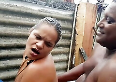 Plump, ebony chick is sucking dick and getting it from the back, in the backyard