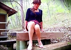 Mature crossdresser Pai-Chan enjoys a solo outdoor hike while getting off