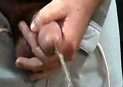 Guy Wanking To Music & Pissing On A Couch