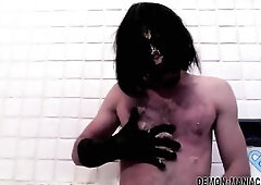 Masked sissy masturbates with food