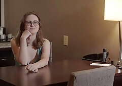 An artist gets painted by a suspended model