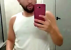 I almost got caught exposing myself in the gym bathroom, and the guys almost caught me.