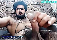 hairy guy tugging his big dick outdoor living