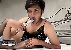 Sexy sissy slut in feminine clothing deep throats her toy then begins fucking herself to orgasm