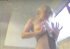 Golden-haired stretches her snatch with large sex tool in advance of washroom doggystyle screw.