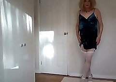 Blue party dres swith white stockings and high heels