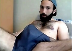 Young stud toying in his undies pulls out a massive cock